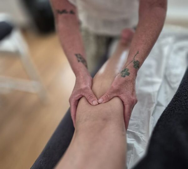 Leg massage during Swedish massage training