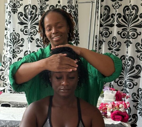 Student giving an Indian head massage