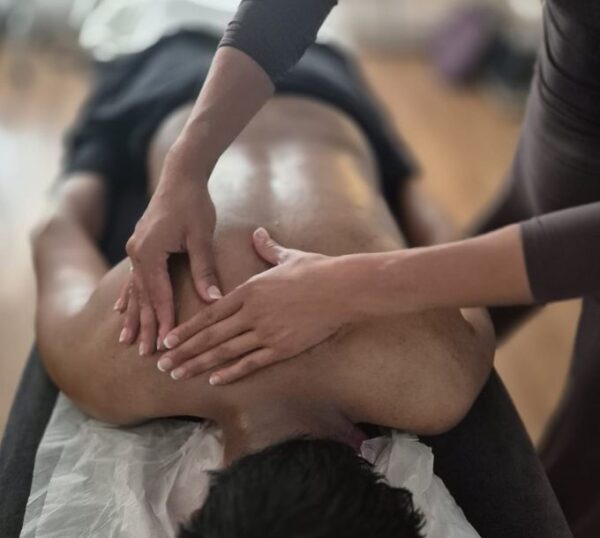 Back massage being given during training