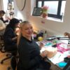 Lash students in a Beauty Academy training room