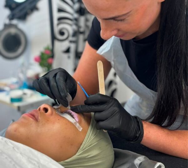 Student carrying out a lash lift in training