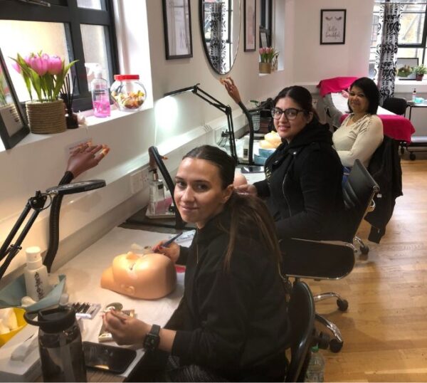 Lash students smiling during a training course