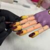 Gel polish nails on a practice hand