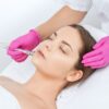 Client receiving a microdermabrasion facial