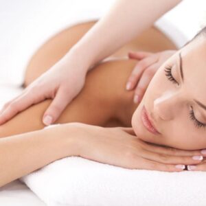 Woman relaxing during a back massage