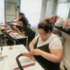 Students practising treatments during a beauty course
