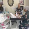 Students practising pedicures during training