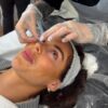 Brows being shaped during lash and brow training