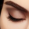 Close-up of a groomed brow and eyeshadow