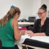 Tutor and student during a beauty training session