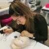Student concentrating during a Beauty Academy course
