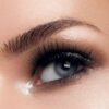 Close-up of a laminated, shaped and tinted eyebrow