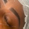Close-up of laminated and tinted brows