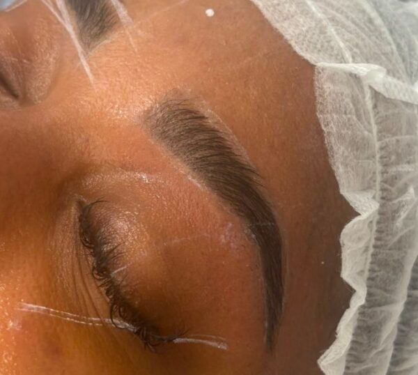Close-up of laminated and tinted brows