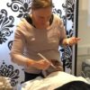 Student practising treatments in a training room