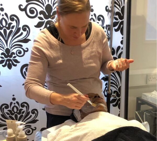 Student practising treatments in a training room