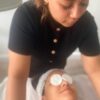 Student giving a facial massage