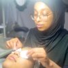 Student practising a skincare treatment
