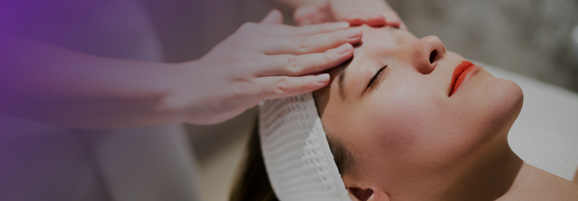 Client relaxing during a facial treatment