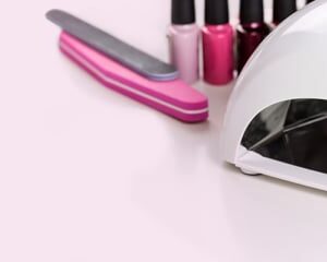 Gel nail polishes and a UV nail lamp