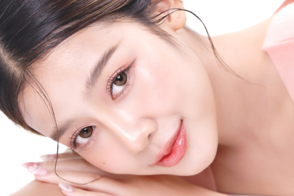 Woman with smooth, glowing Korean glass skin