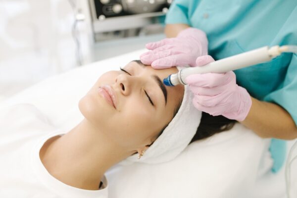 Client receiving a hydra dermabrasion facial